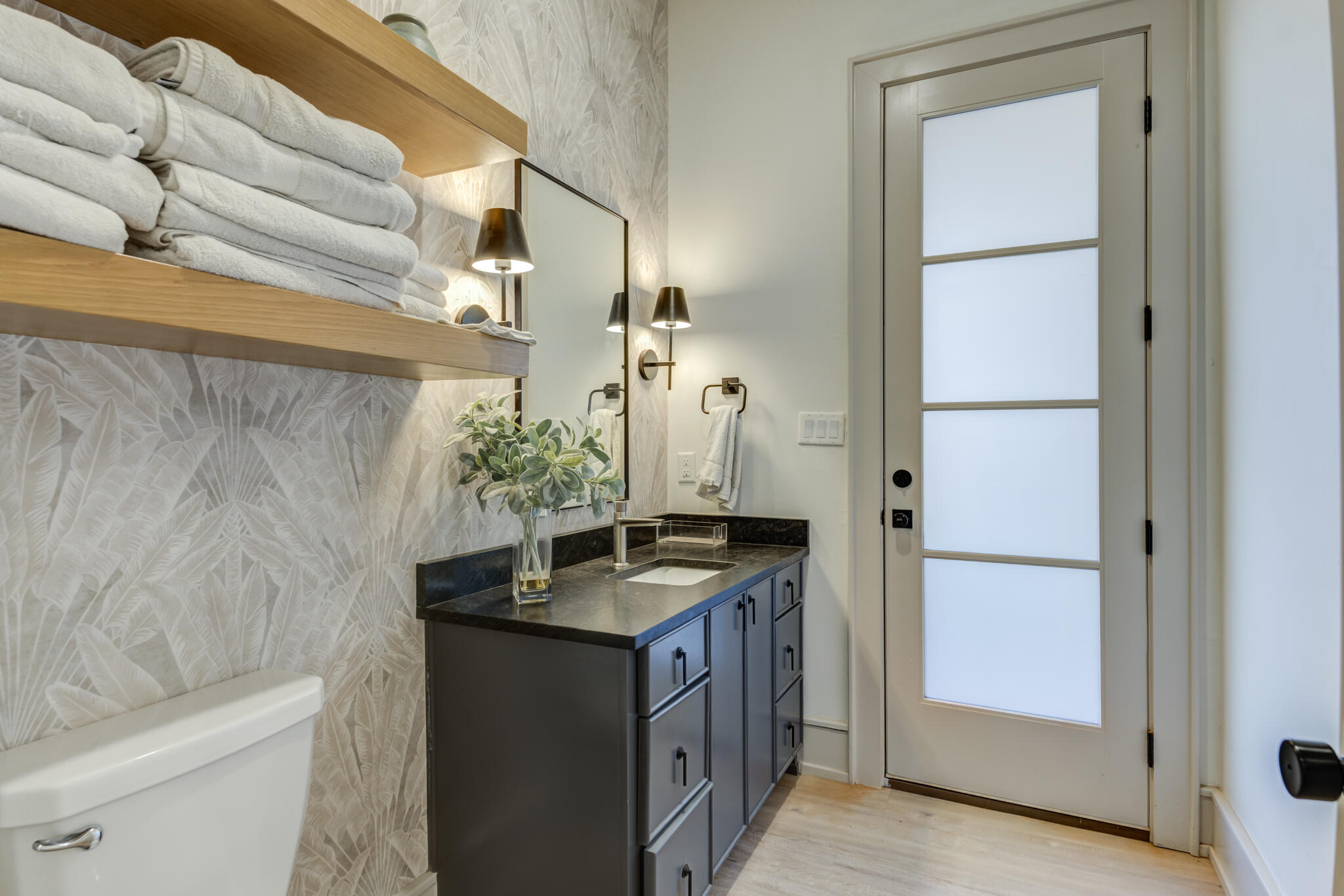 3940 148th Street Lubbock, TX 79423 - Photo 71 of 92 a bathroom with a granite countertop sink a toilet and shower
