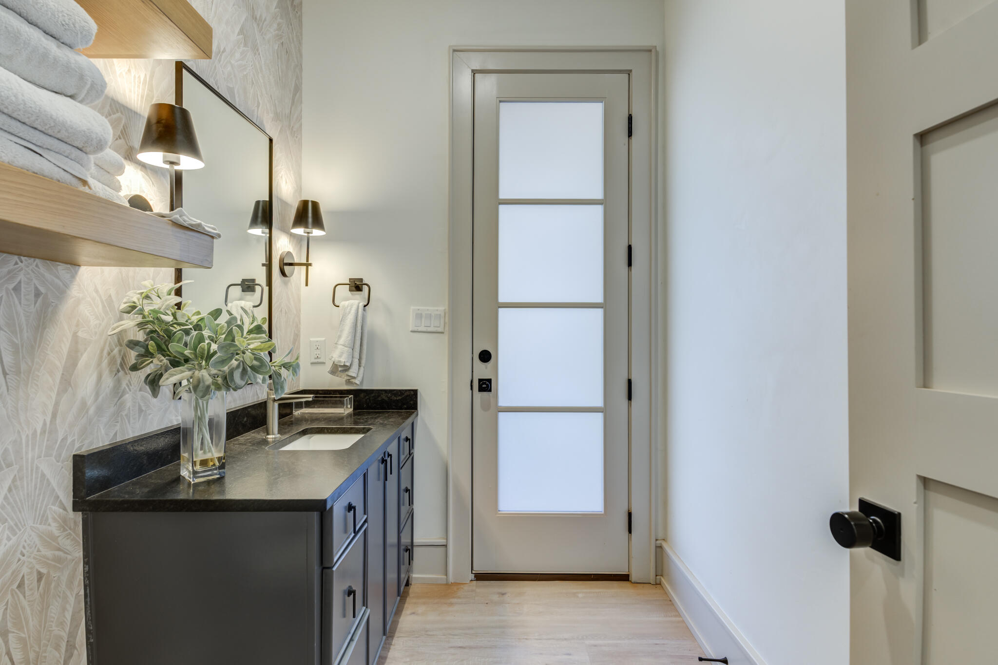 3940 148th Street Lubbock, TX 79423 - Photo 72 of 92 a bathroom with a sink and a mirror
