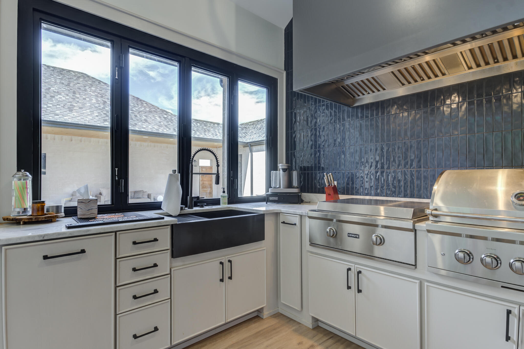3940 148th Street Lubbock, TX 79423 - Photo 90 of 92 a kitchen with cabinets appliances a sink and a window