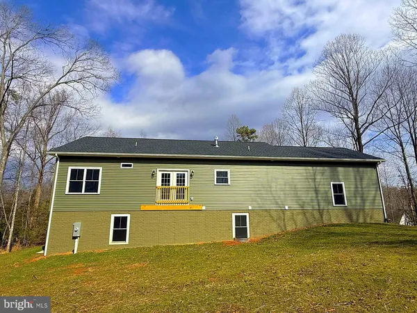 front view of house with a yard