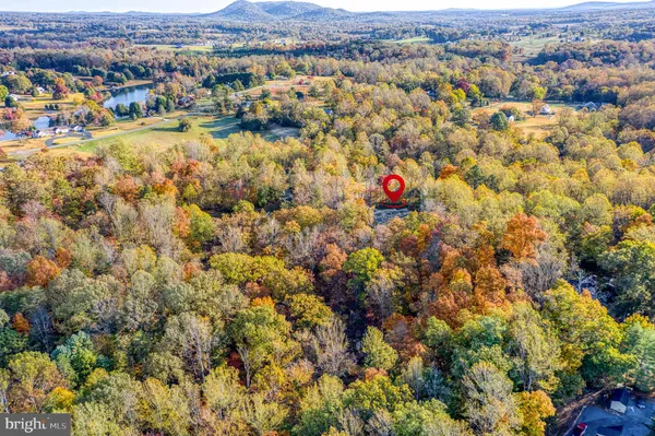 a view of lake with mountain in the background
