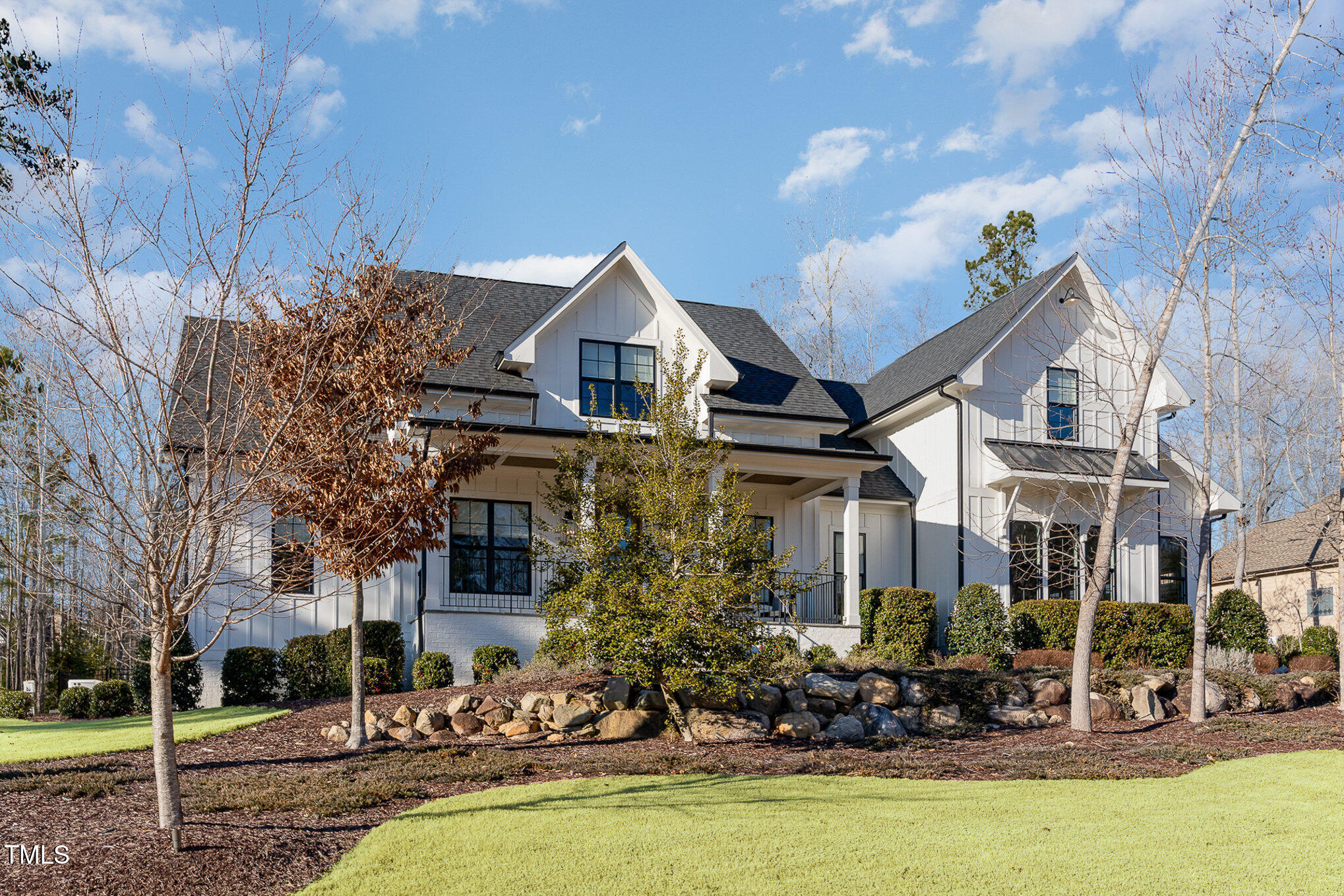 403 Stonecrest Way Pittsboro, NC 27312 - Photo 2 of 65 a front view of a house with swimming pool