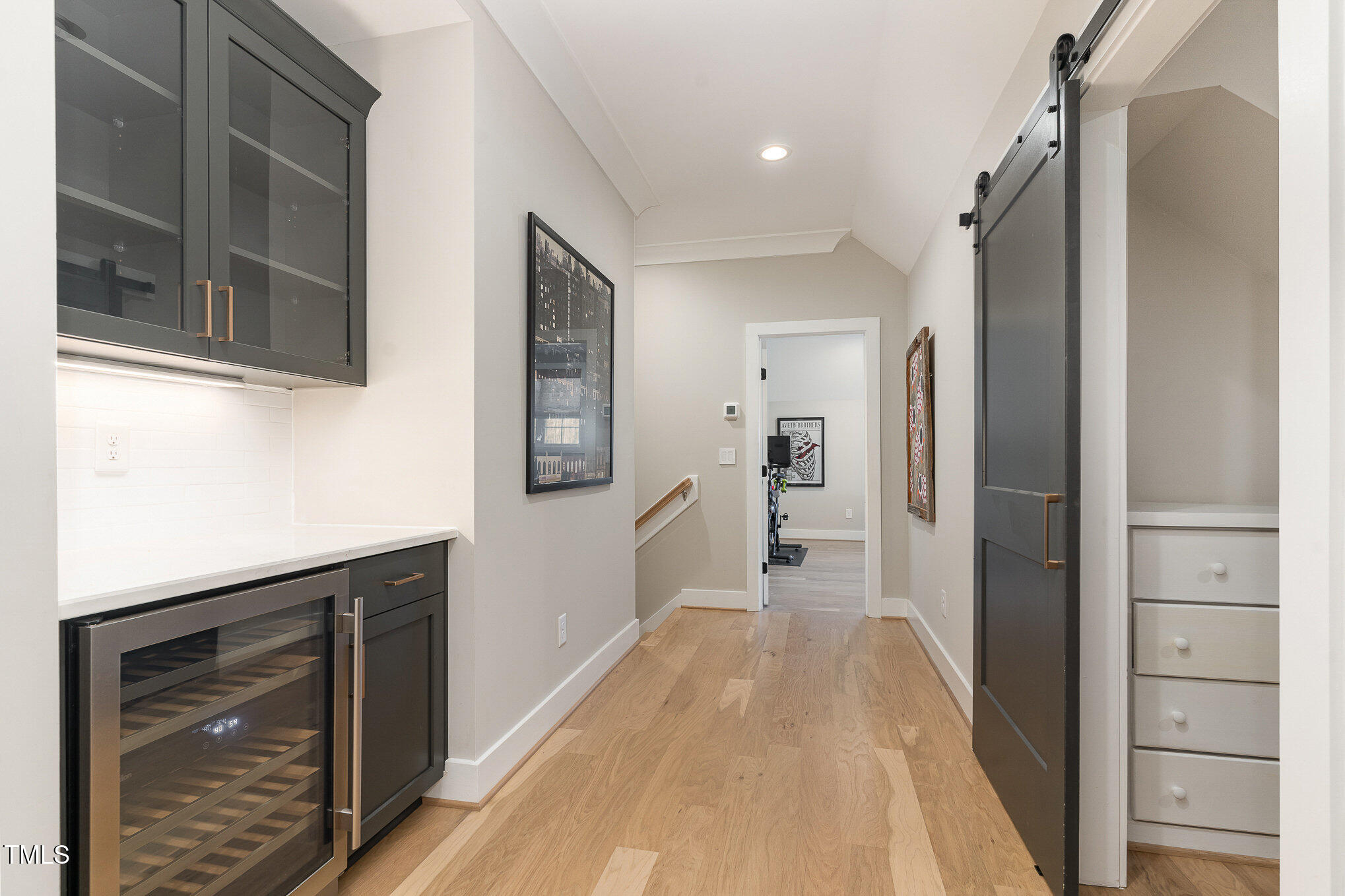 403 Stonecrest Way Pittsboro, NC 27312 - Photo 27 of 65 a view of a hallway with wooden floor and staircase