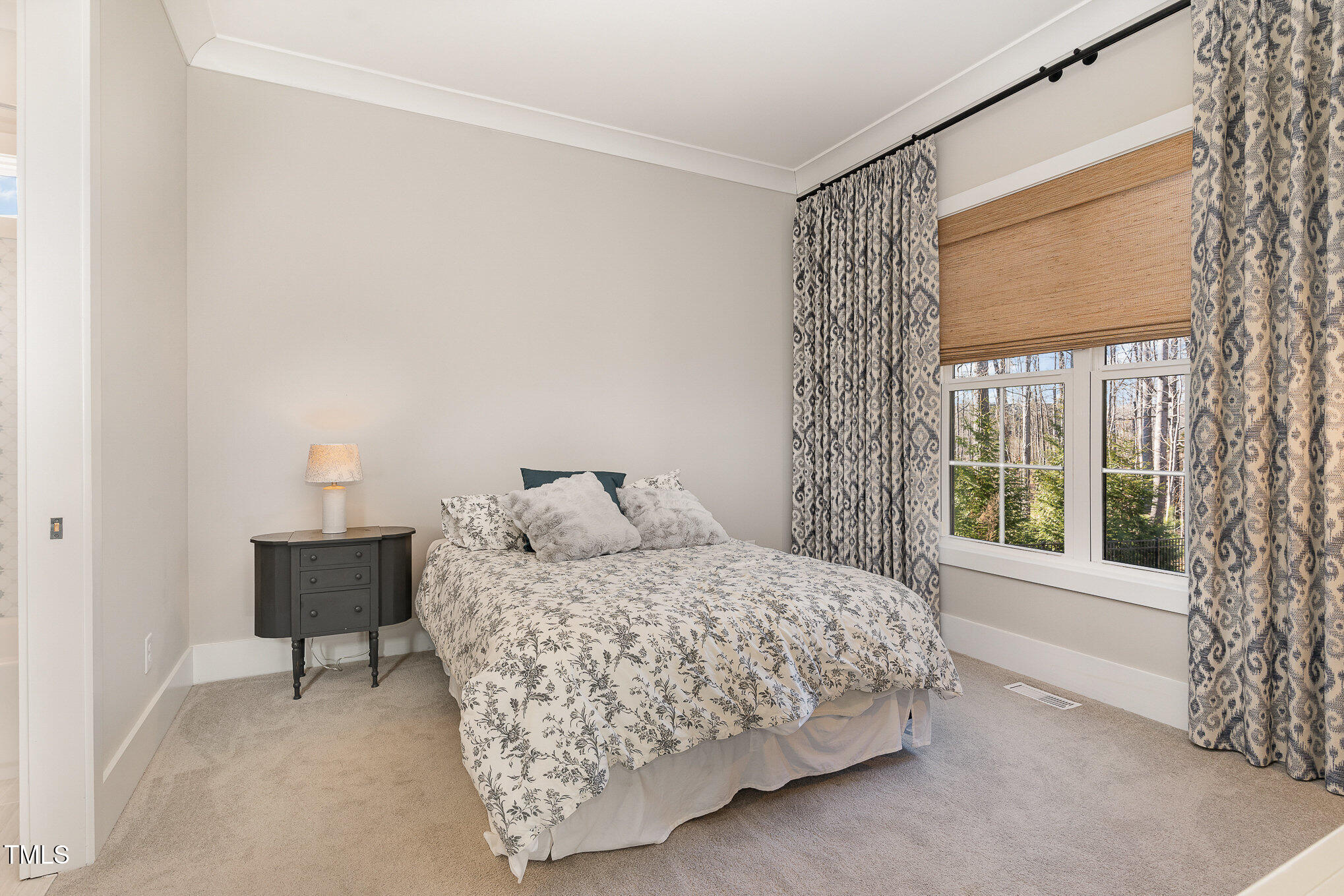 403 Stonecrest Way Pittsboro, NC 27312 - Photo 30 of 65 a bedroom with a bed and a window