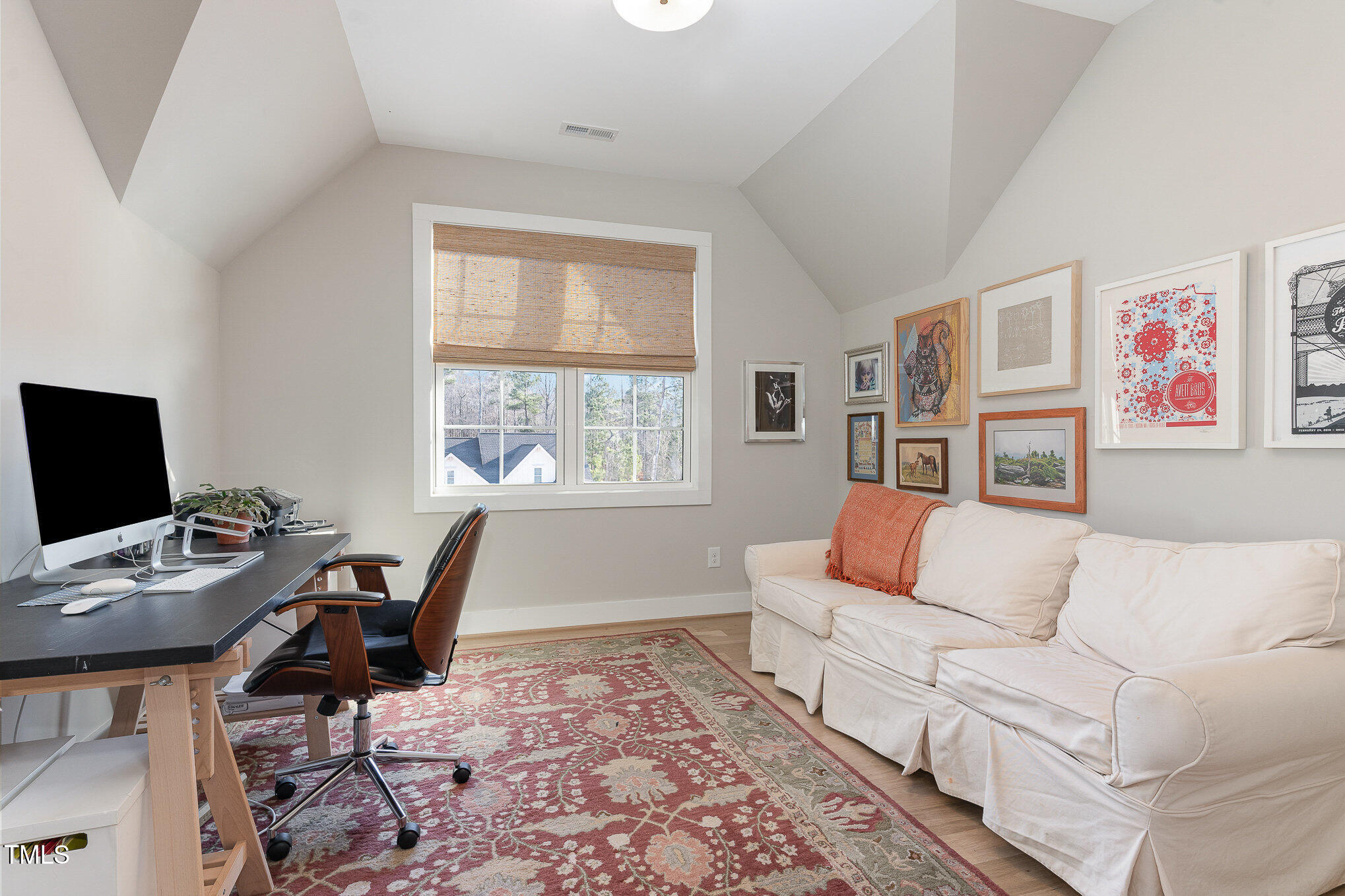 403 Stonecrest Way Pittsboro, NC 27312 - Photo 31 of 65 a living room with furniture and a window