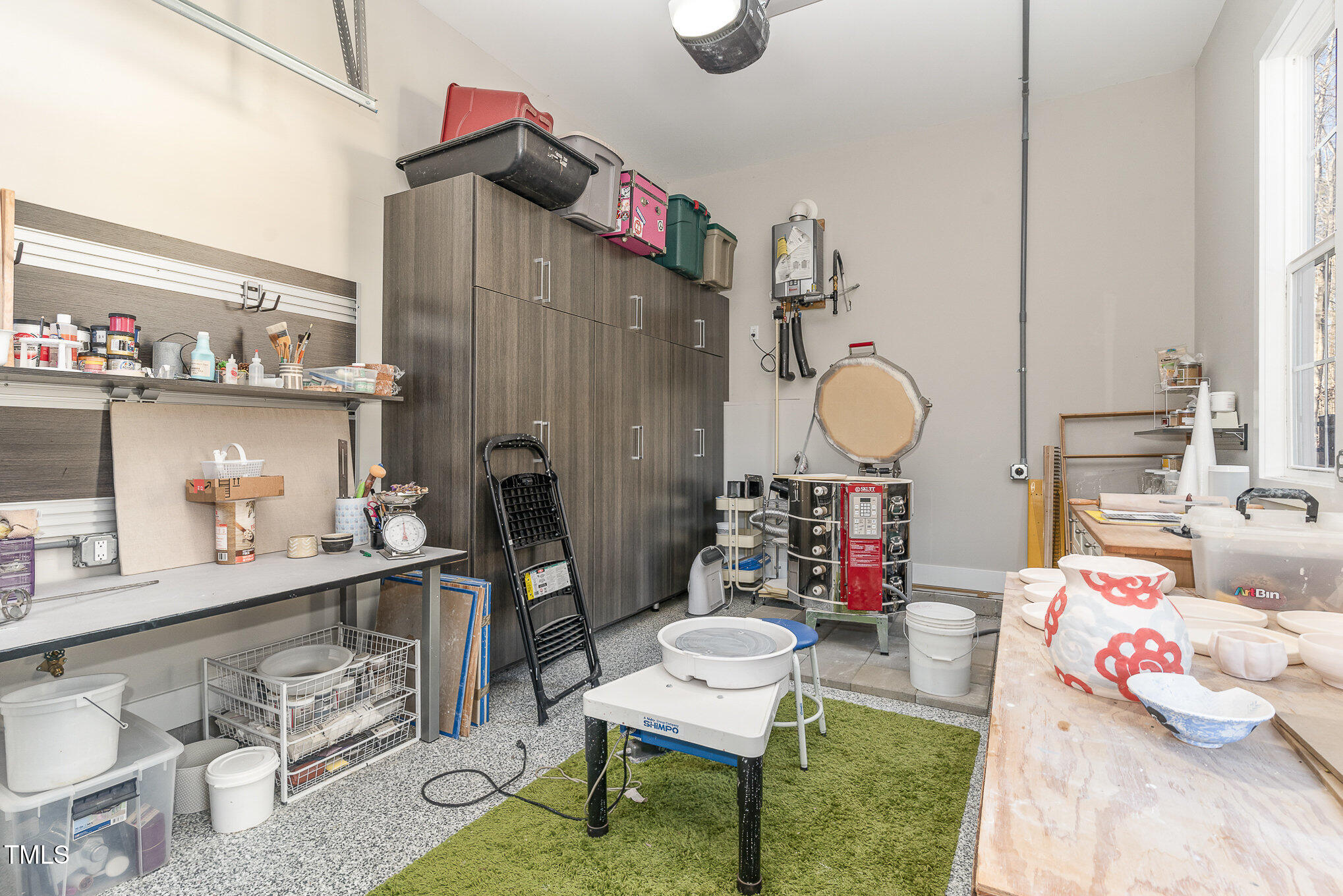 403 Stonecrest Way Pittsboro, NC 27312 - Photo 36 of 65 a living room with furniture and a table