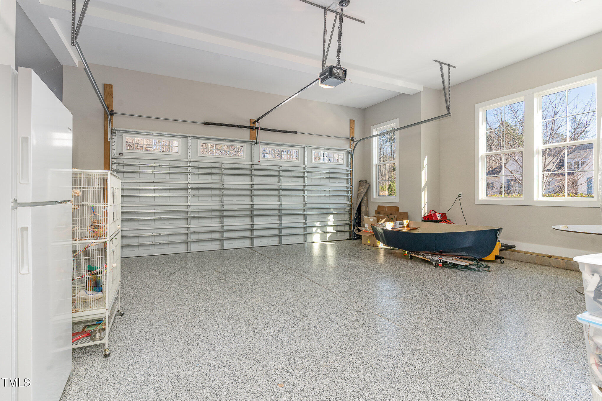 403 Stonecrest Way Pittsboro, NC 27312 - Photo 40 of 65 a living room with furniture gym equipment and a window