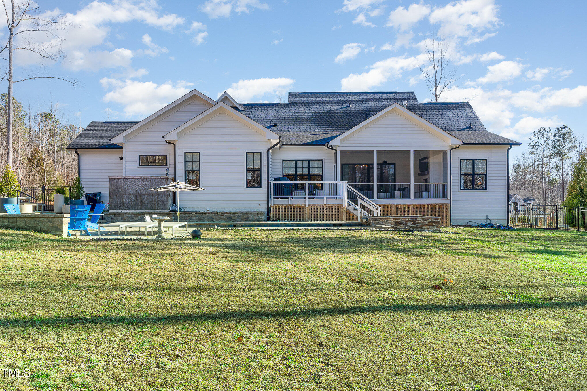 403 Stonecrest Way Pittsboro, NC 27312 - Photo 44 of 65 a front view of a house with a swimming pool