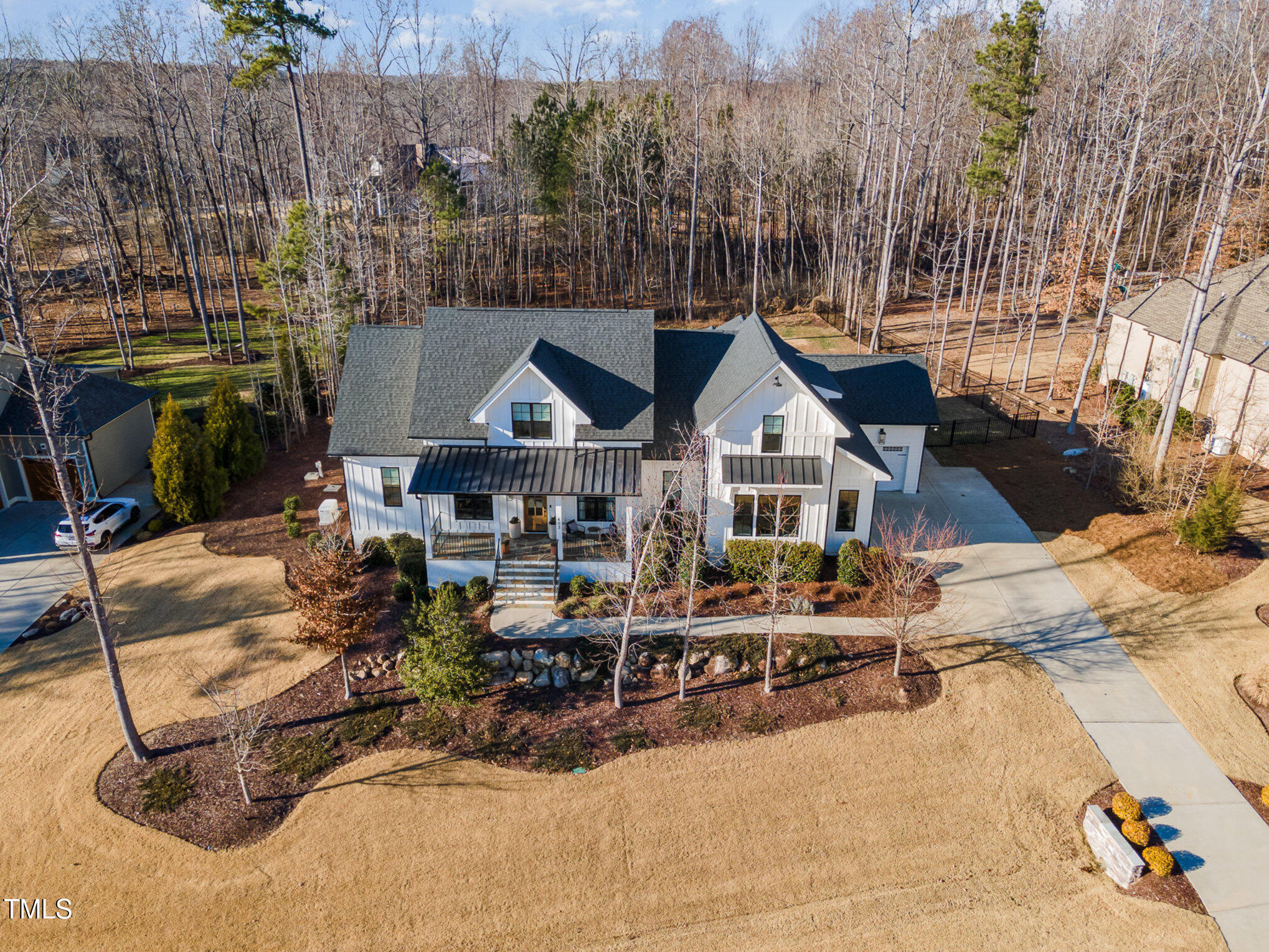 403 Stonecrest Way Pittsboro, NC 27312 - Photo 46 of 65 a front view of a house with a small yard