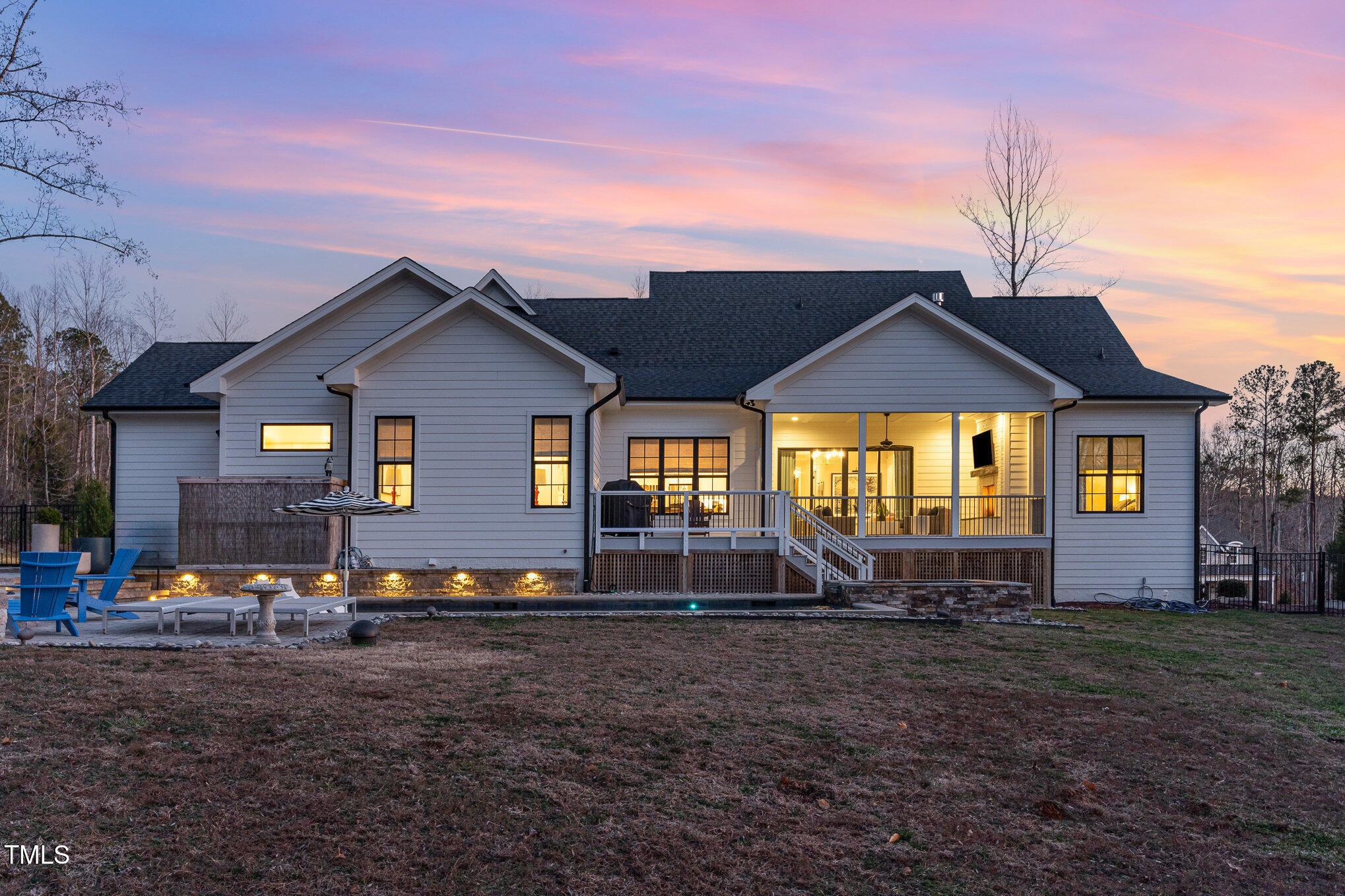 403 Stonecrest Way Pittsboro, NC 27312 - Photo 52 of 65 a front view of a house with garden