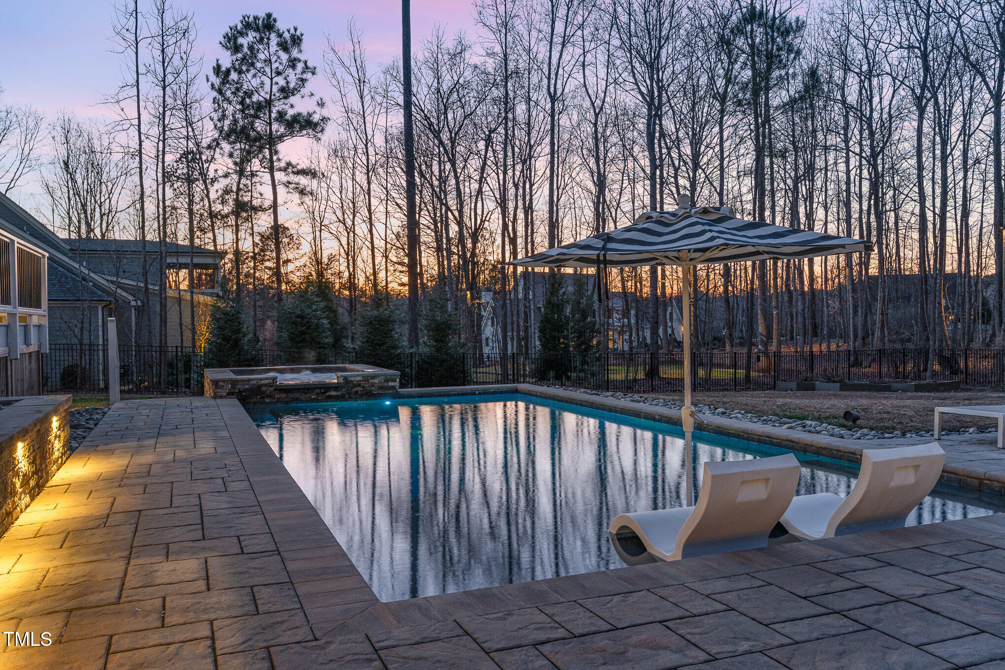 403 Stonecrest Way Pittsboro, NC 27312 - Photo 56 of 65 a view of a swimming pool with a patio