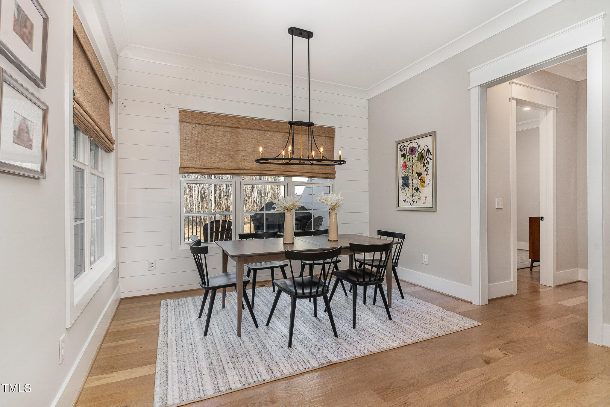 403 Stonecrest Way Pittsboro, NC 27312 - Photo 9 of 65 a view of a dining room with furniture window and wooden floor