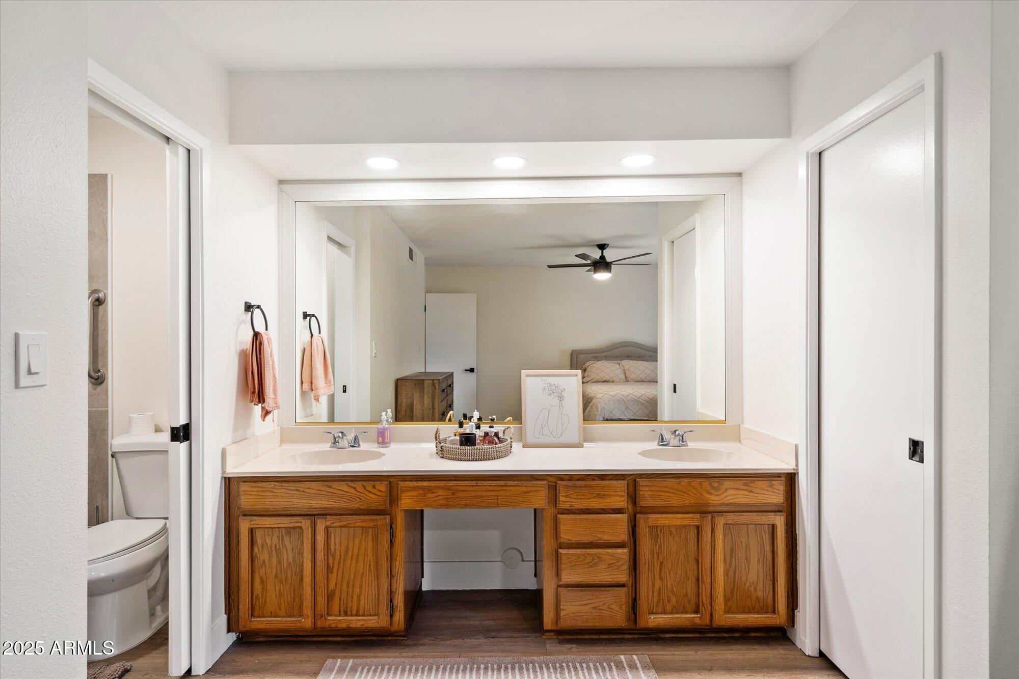 3415 North 36th Street, Unit 4 Phoenix, AZ 85018 - Photo 10 of 15 a bathroom with a double vanity sink double and mirror