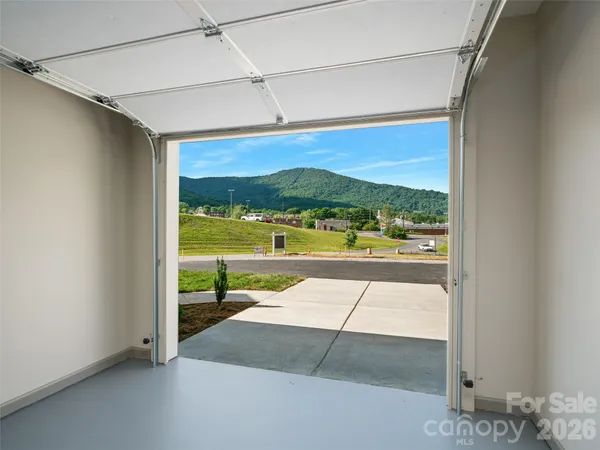 a view of swimming pool with a balcony