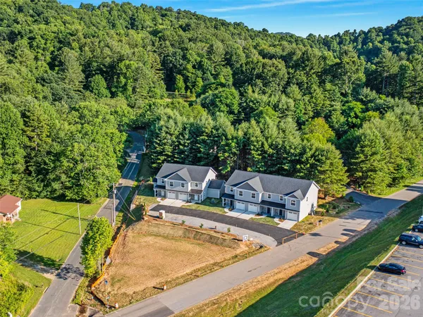 swimming pool view with a seating space