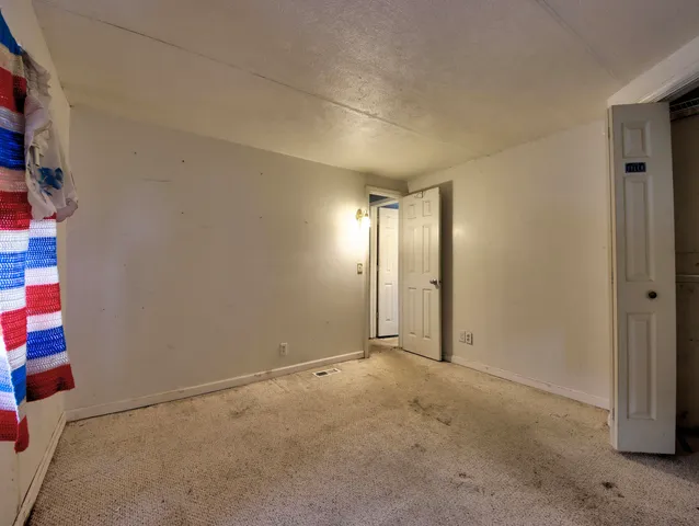 a bathroom with a sink a toilet and a shower