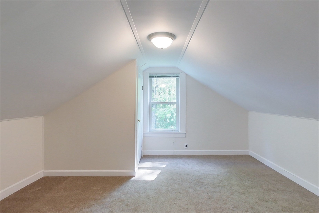 92 Squannacook Road Shirley, MA 01464 - Photo 18 of 38 an empty room with windows and entrance