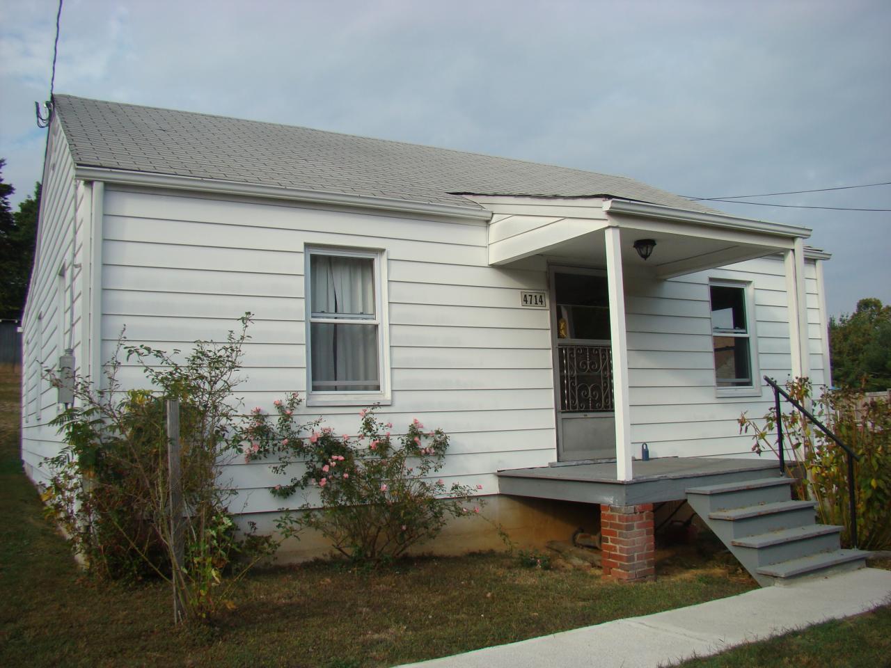 4714 Goodman Road Roanoke, VA 24014 - Photo 1 of 1 a front view of house with yard