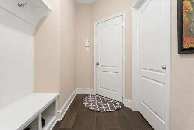 a view of room with window and bathroom