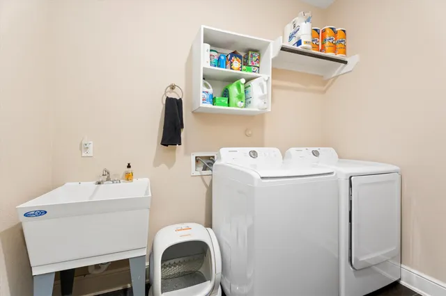 a utility room with dryer and washer