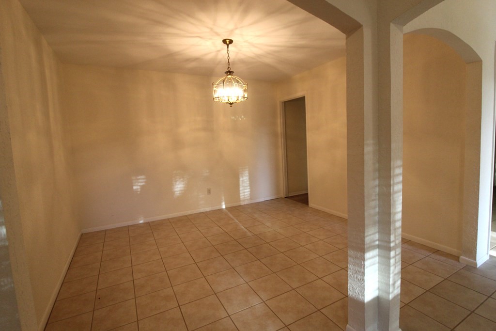 1910 Oak Ridge Drive Portland, TX 78374 - Photo 12 of 40 a view of a livingroom with a chandelier