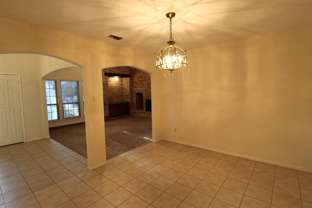 1910 Oak Ridge Drive Portland, TX 78374 - Photo 14 of 40 a view of a livingroom with a chandelier