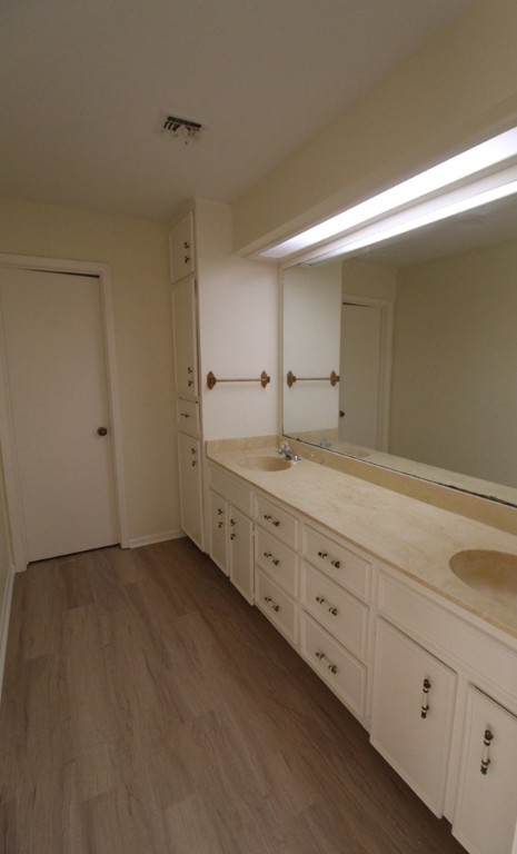 1910 Oak Ridge Drive Portland, TX 78374 - Photo 19 of 40 a bathroom with a double vanity sink and a mirror