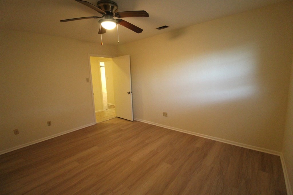 1910 Oak Ridge Drive Portland, TX 78374 - Photo 22 of 40 wooden floor in an empty room