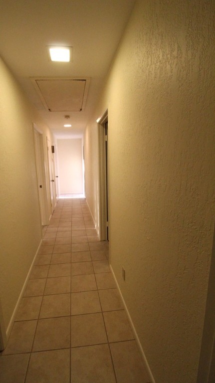 1910 Oak Ridge Drive Portland, TX 78374 - Photo 27 of 40 a view of hallway with a bathroom