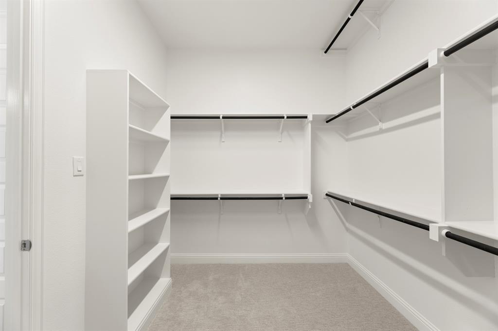 708 Splendor Drive McKinney, TX 75072 - Photo 19 of 29 a view of an empty walk in closet