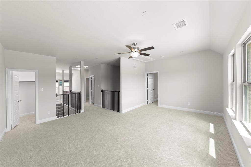 708 Splendor Drive McKinney, TX 75072 - Photo 21 of 29 a view of an empty room with a window