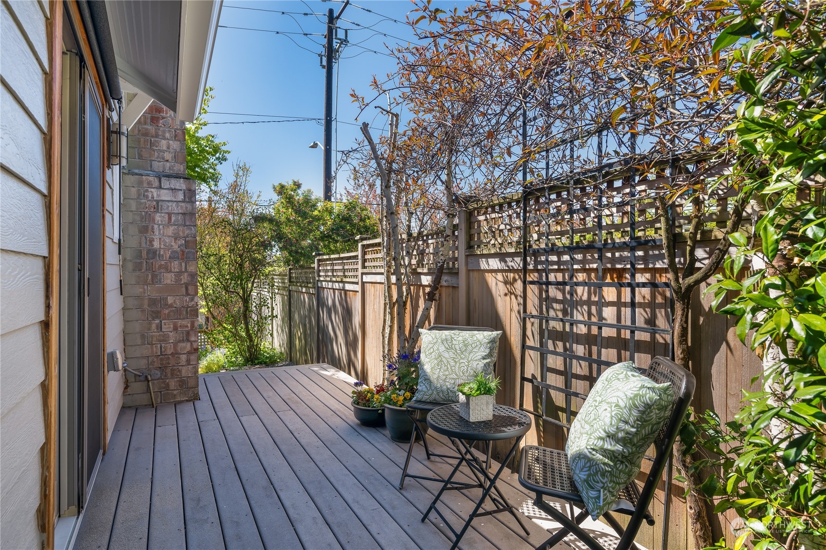 1408 Northwest 73rd Street Seattle, WA 98117 - Photo 12 of 40 a view of balcony with furniture and wooden floor
