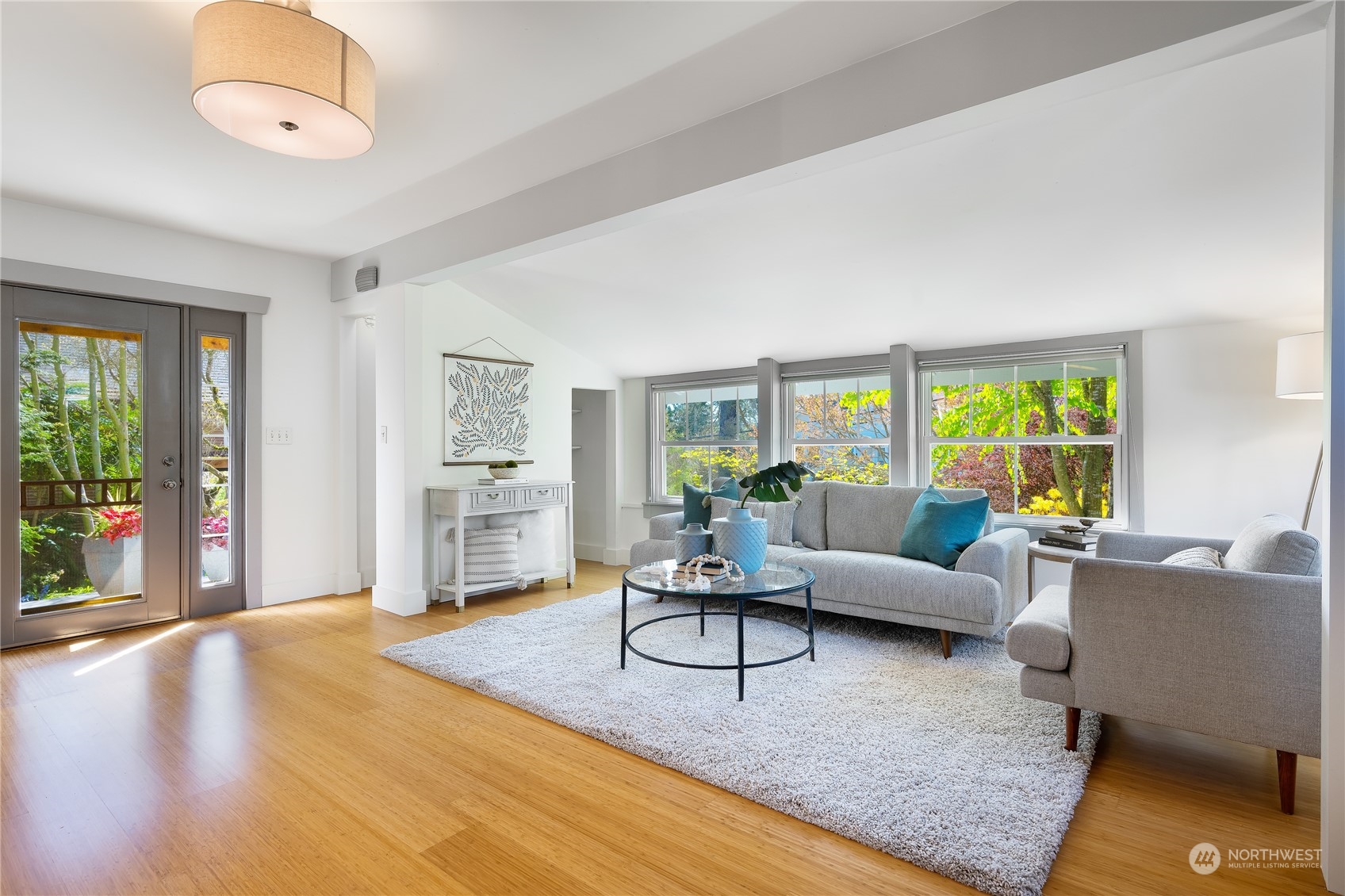 1408 Northwest 73rd Street Seattle, WA 98117 - Photo 2 of 40 a living room with furniture and a large window