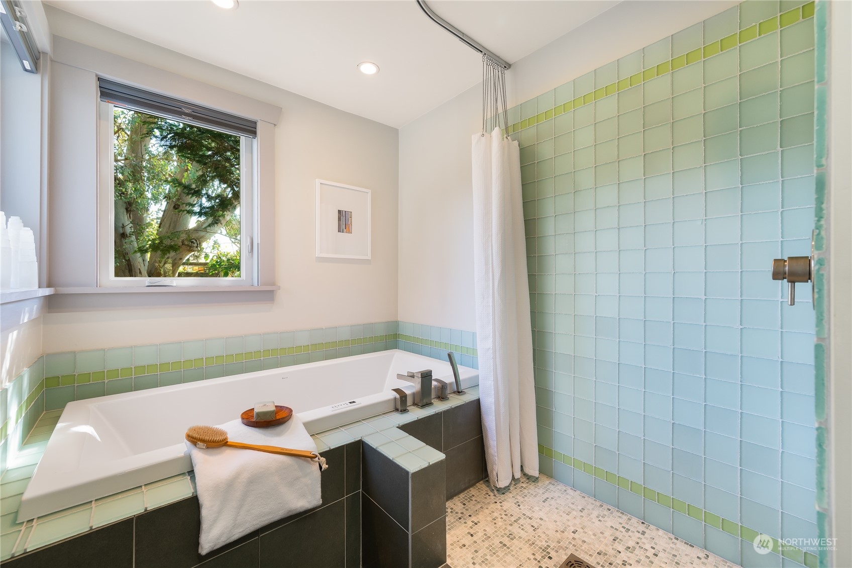 1408 Northwest 73rd Street Seattle, WA 98117 - Photo 26 of 40 a bathroom with a sink and a bathtub