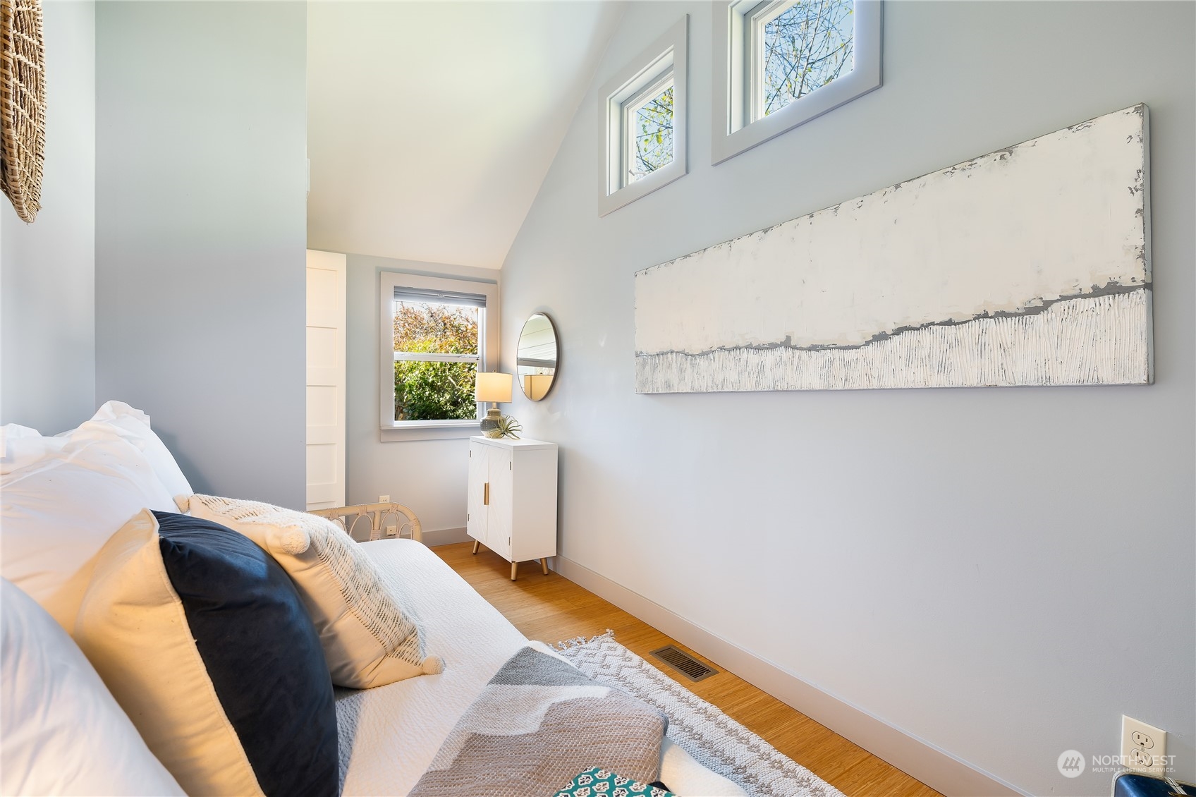 1408 Northwest 73rd Street Seattle, WA 98117 - Photo 28 of 40 a bedroom with a bed and a window