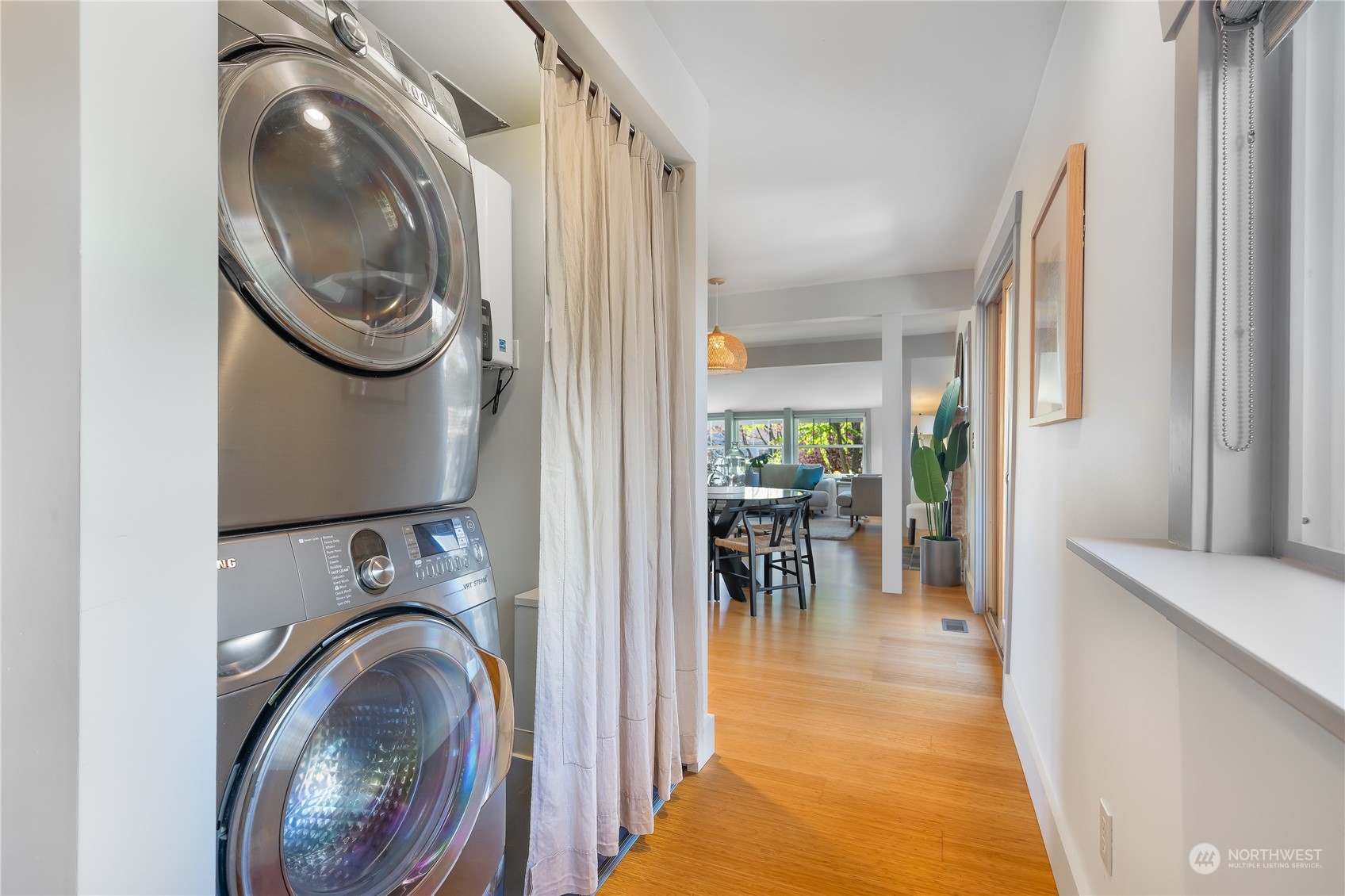1408 Northwest 73rd Street Seattle, WA 98117 - Photo 29 of 40 a view of a hallway with washer and dryer