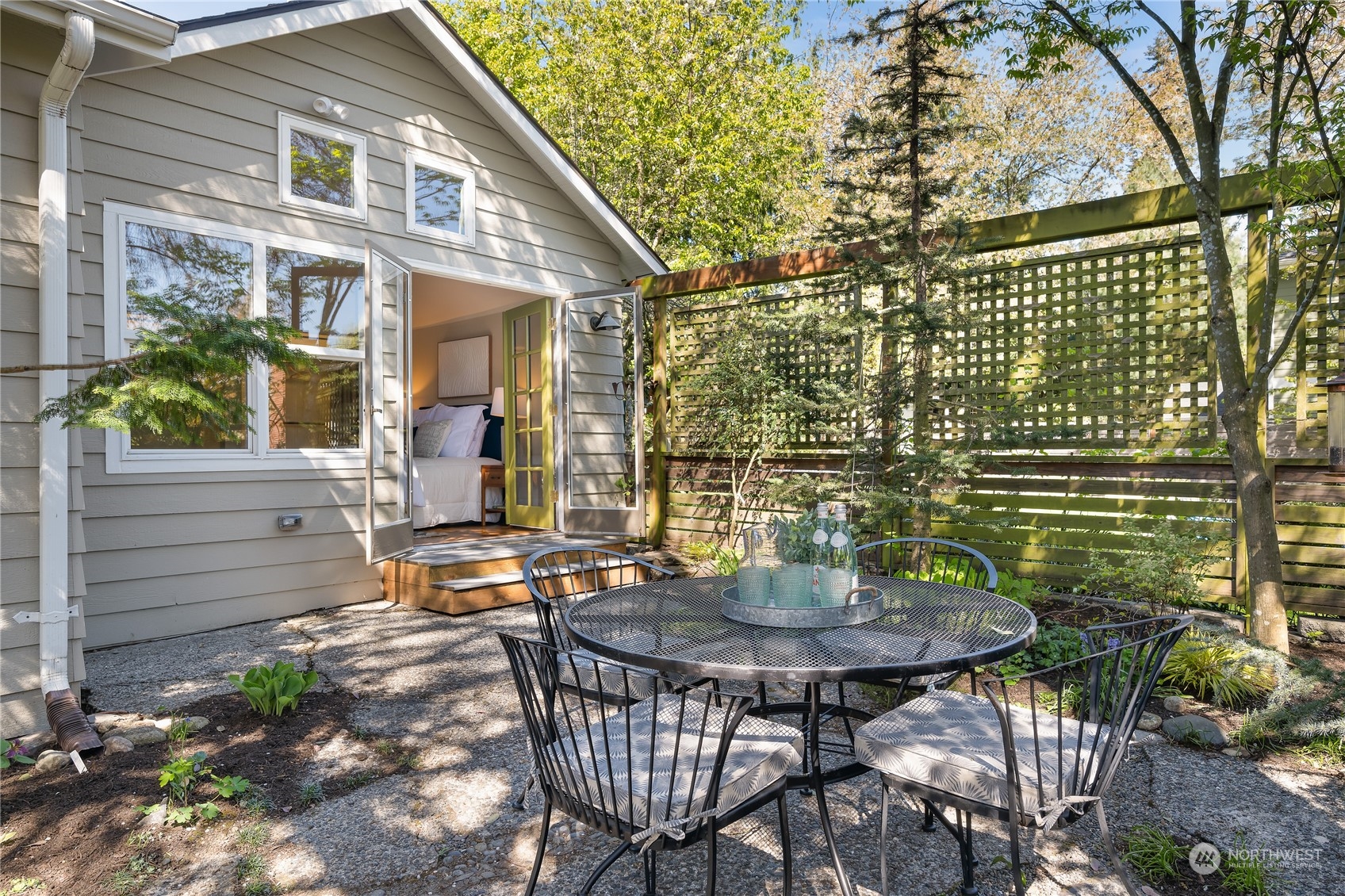 1408 Northwest 73rd Street Seattle, WA 98117 - Photo 31 of 40 a backyard of a house with table and chairs