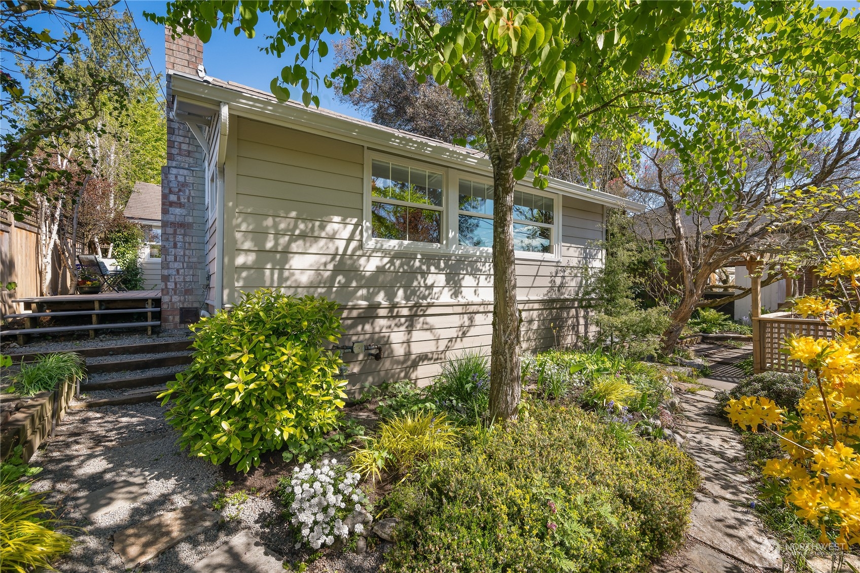 1408 Northwest 73rd Street Seattle, WA 98117 - Photo 34 of 40 a front view of a house with garden