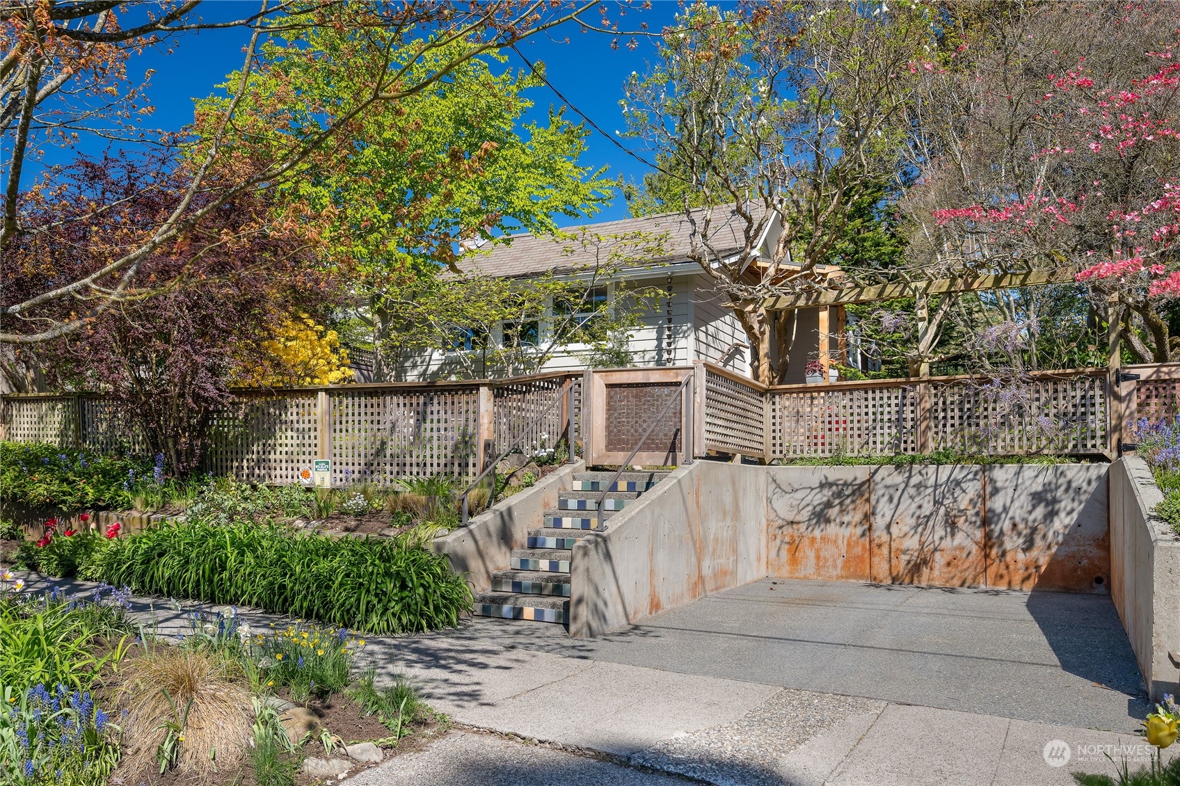 1408 Northwest 73rd Street Seattle, WA 98117 - Photo 36 of 40 a view of a house with a yard