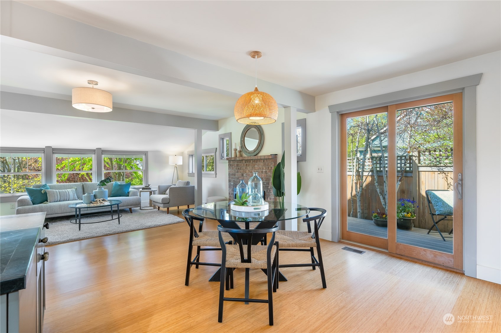 1408 Northwest 73rd Street Seattle, WA 98117 - Photo 8 of 40 a dining room with furniture a large window and wooden floor
