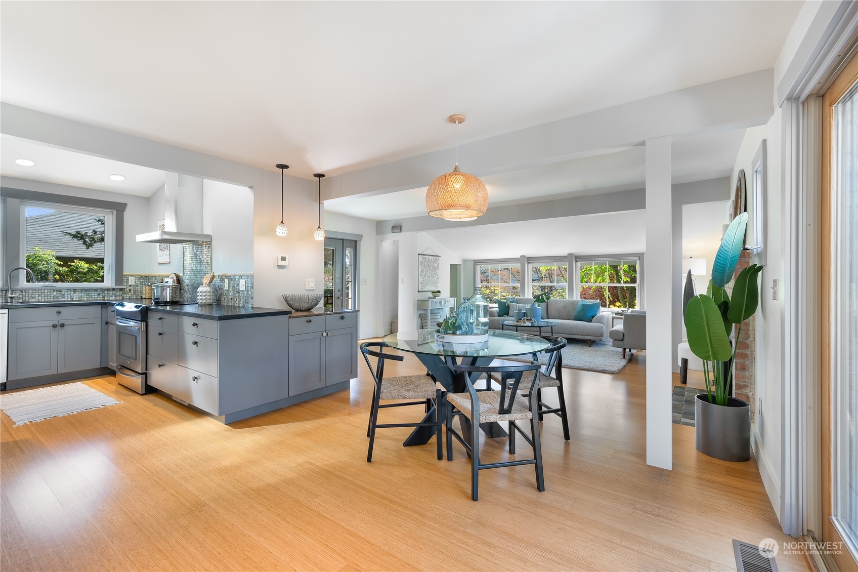 1408 Northwest 73rd Street Seattle, WA 98117 - Photo 9 of 40 a view of a dining room with furniture window and wooden floor