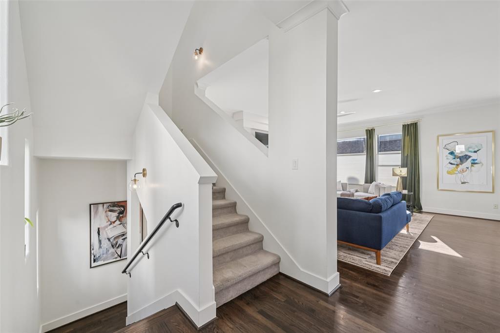 3926 Holland Avenue, Unit 102 Dallas, TX 75219 - Photo 11 of 40 a view of entryway and hall with wooden floor