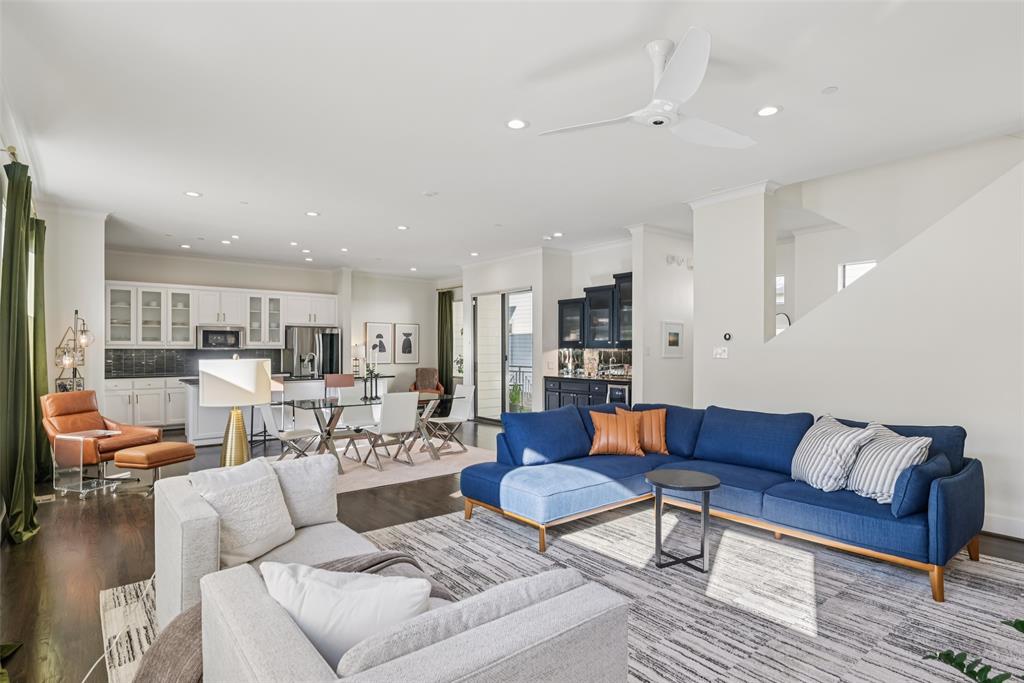 3926 Holland Avenue, Unit 102 Dallas, TX 75219 - Photo 22 of 40 a living room with furniture kitchen view and a table