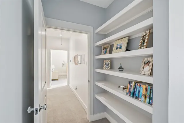 a bathroom with a tub and shower