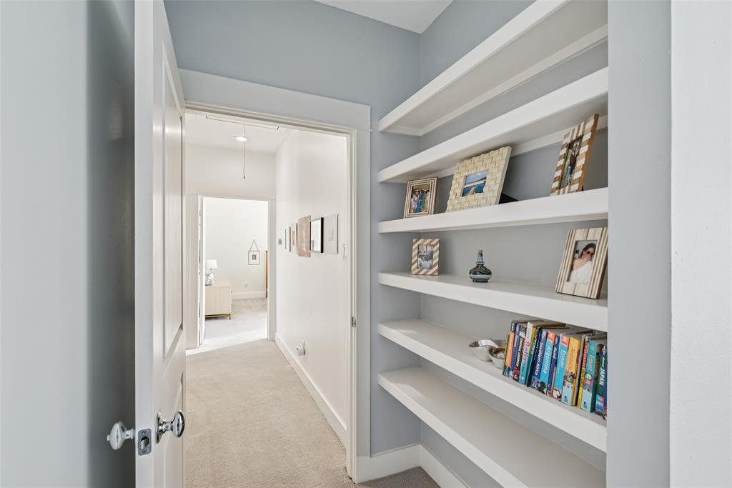 3926 Holland Avenue, Unit 102 Dallas, TX 75219 - Photo 30 of 40 a view of bedroom with baby crib and closet