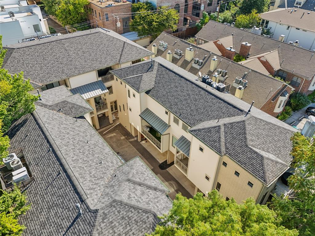 3926 Holland Avenue, Unit 102 Dallas, TX 75219 - Photo 39 of 40 an aerial view of a house with large trees