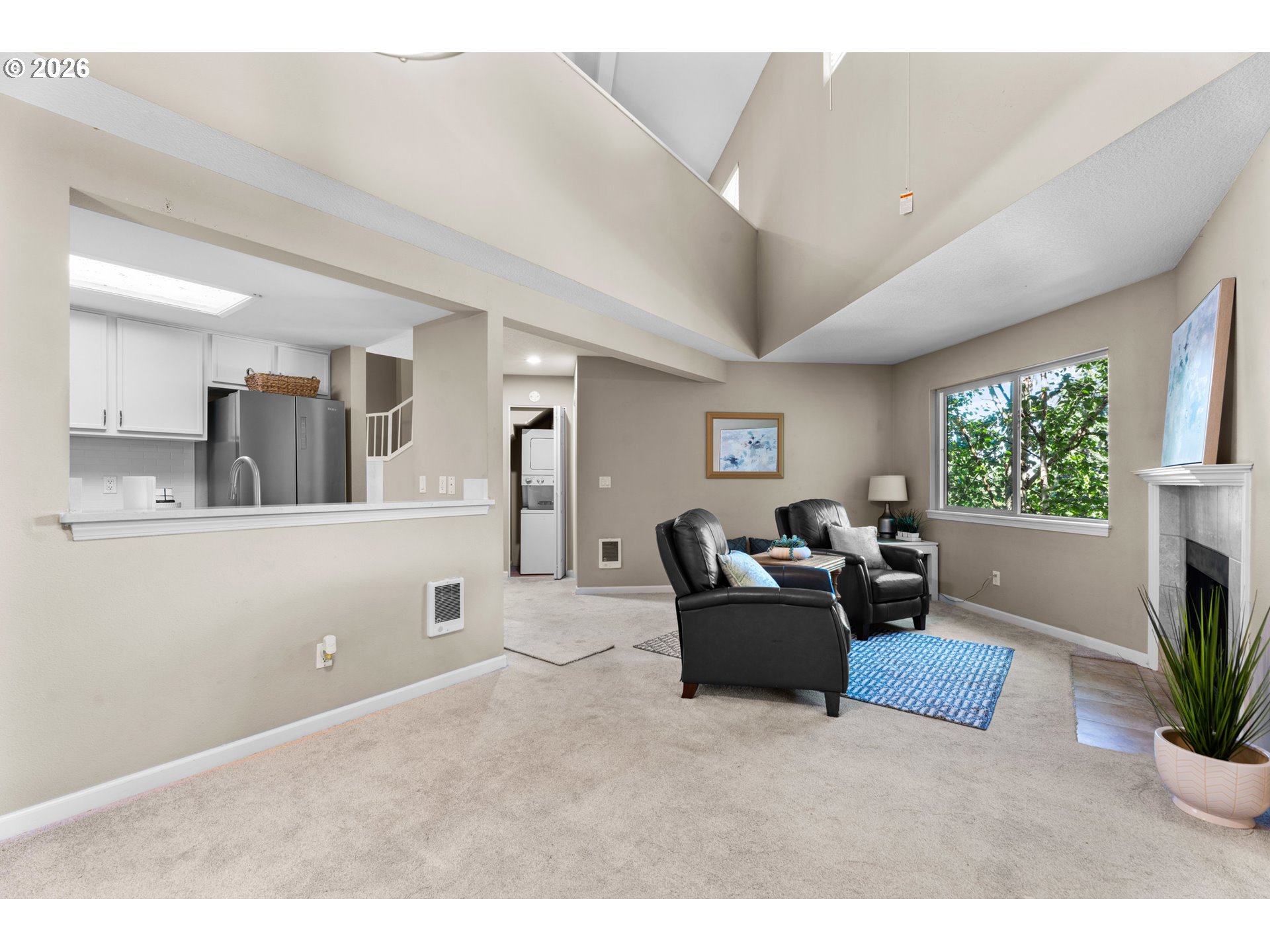 10178 Southeast Talbert Street Clackamas, OR 97015 - Photo 7 of 27 a living room with furniture and a flat screen tv