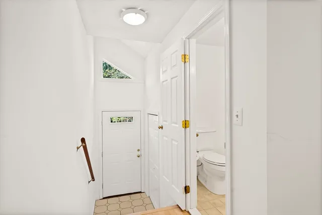 a view of an entryway with staircase