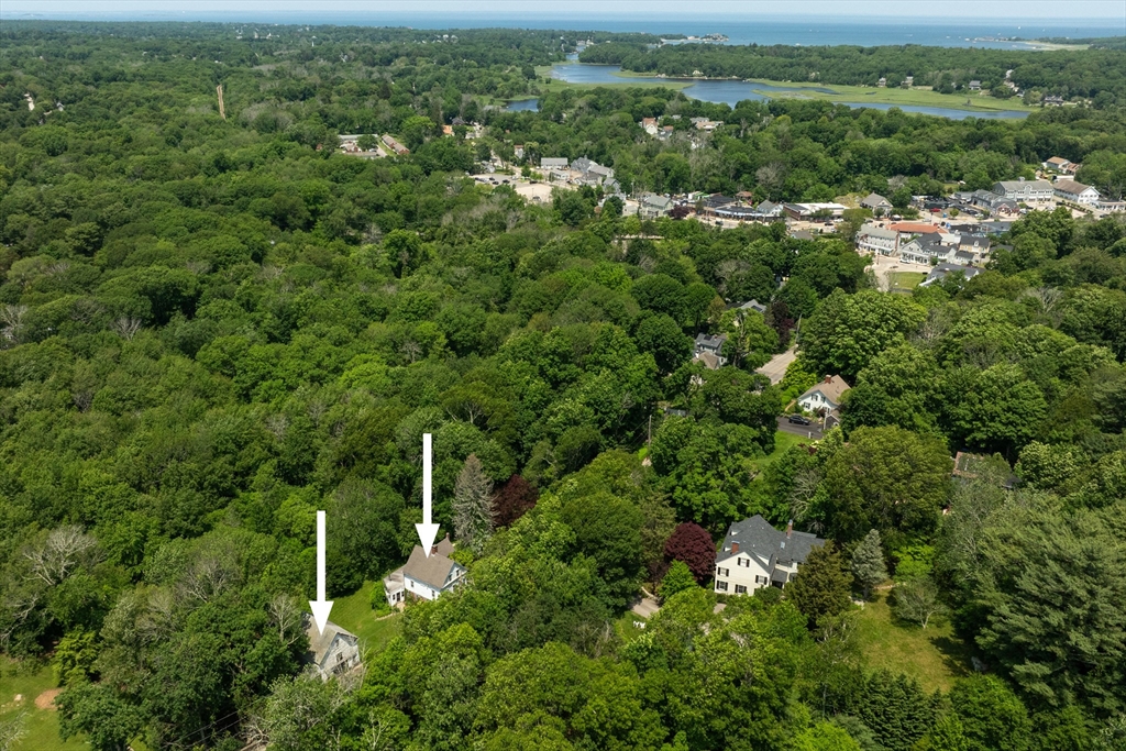 38 Booth Hill Road Scituate, MA 02066 - Photo 4 of 4 an aerial view of a city with lots of residential buildings and mountain view in back
