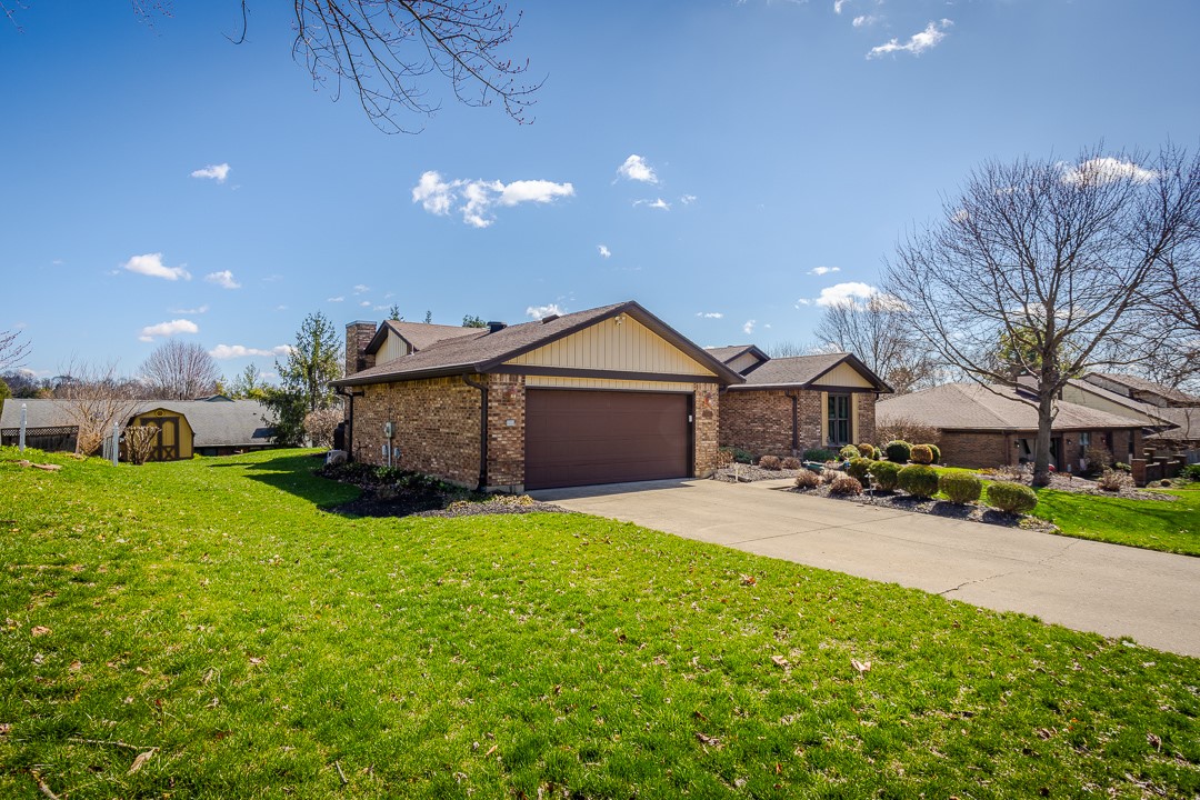 540 Basil Street Springboro, OH 45066 - Photo 29 of 32 This residence features a brick exterior and an attached garage with a spacious driveway.